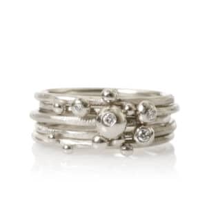 DULONG RINGER DELPHIS SETT MED DIAMANTER