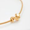 OLE LYNGGAARD ARMBÅND SNAKES BEIGE